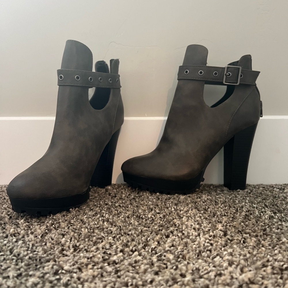 boots 1 small scratch on the heel I bought them like that never worn